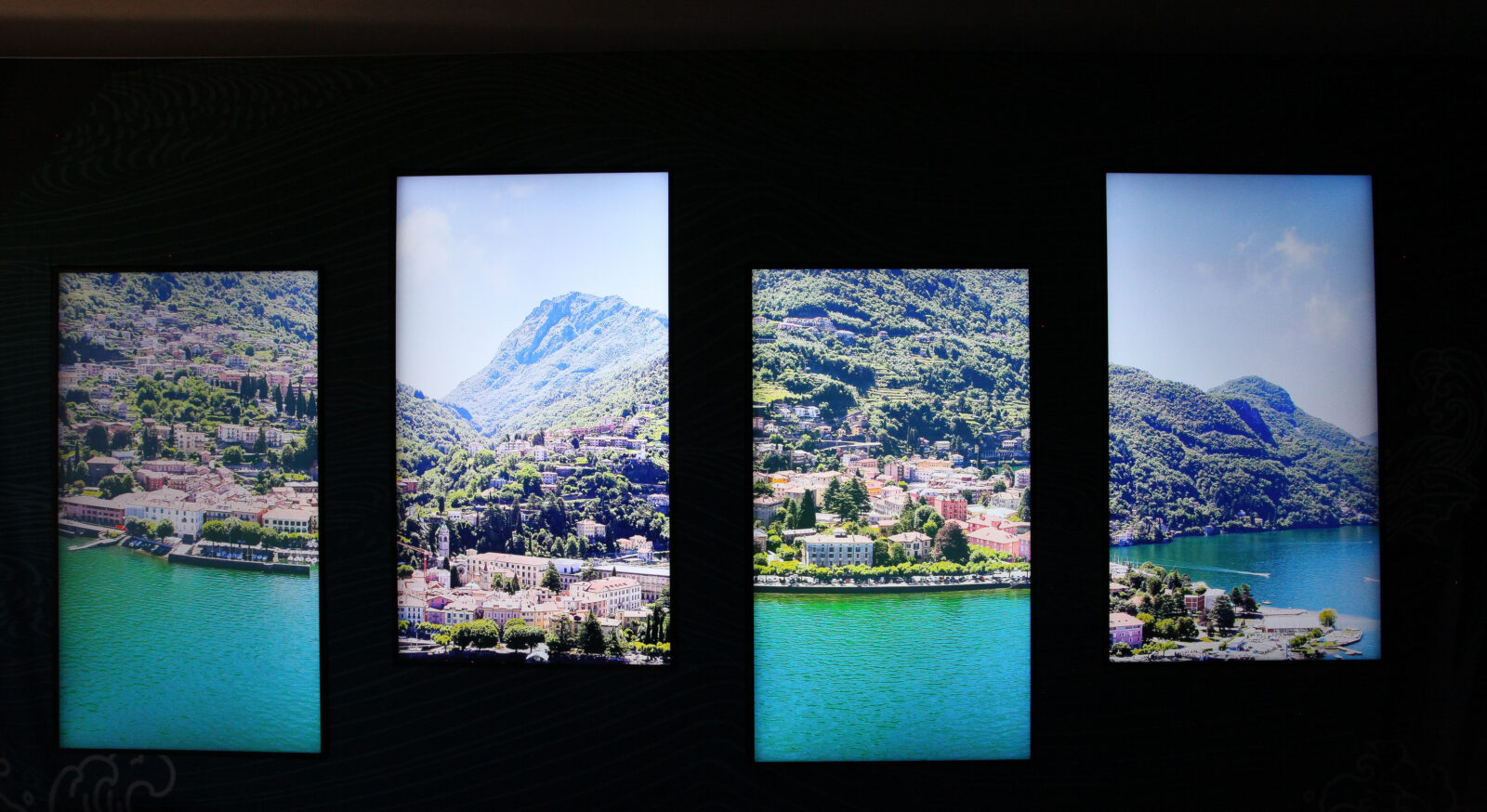 Alcune foto di Bellano su sfondo nero presenti al museo dell'orrido alelstito da ETT